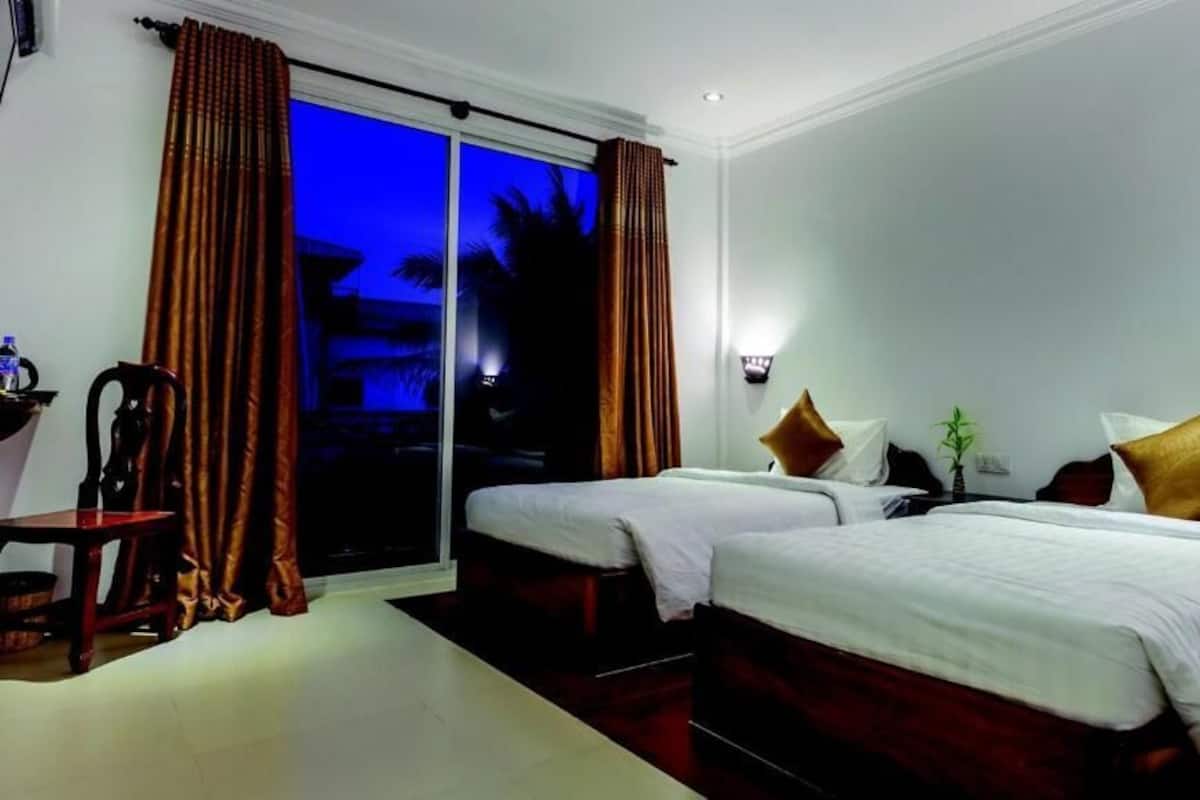 Deluxe Twin Room, Balcony, Pool View | Minibar, in-room safe, soundproofing, free WiFi