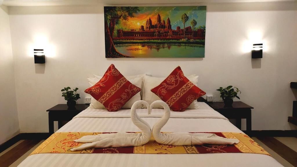 Junior Room, Pool View | Minibar, in-room safe, soundproofing, free WiFi