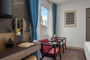 Deluxe Triple Room with Cityview | Literie de qualité, couette en duvet