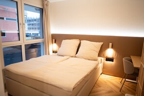 1 slaapkamer, een strijkplank/strijkijzer, wifi, beddengoed