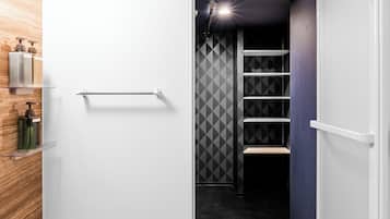 Combined shower/tub, free toiletries, hair dryer, slippers