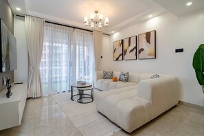 55-inch plasma TV with cable channels, Netflix, first-run films - Urban Oasis View Palace Apartments-3 Bed (Nairobi)