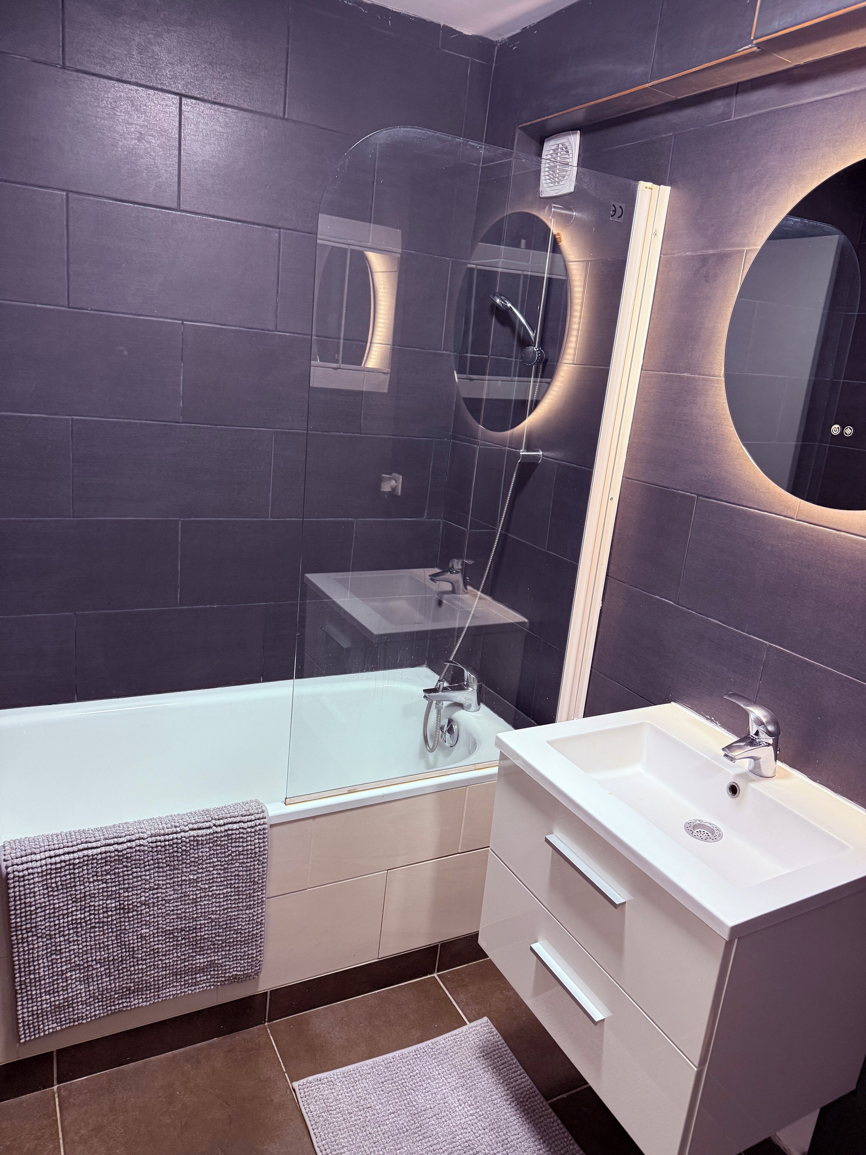 Hair dryer, bidet, towels, soap