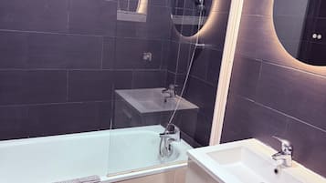 Hair dryer, bidet, towels, soap