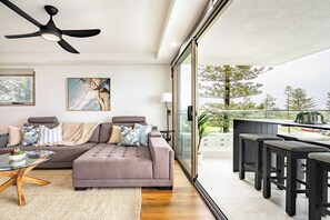 TV, books, offices - Shara Seaside Oasis—Poolside Living by Alex Beach (Maroochydore Region)