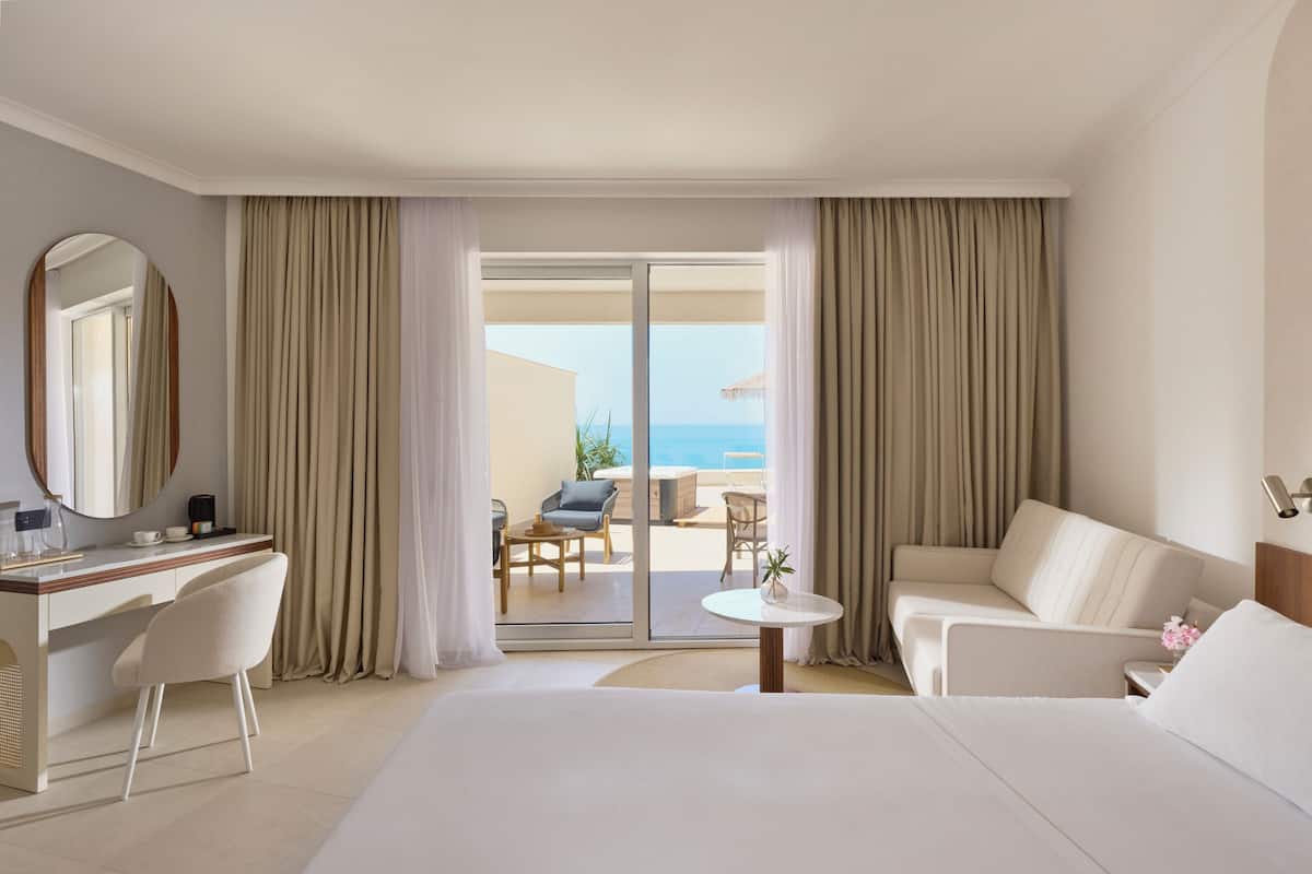 Junior Suite, Terrace, Sea View | Premium bedding, minibar, in-room safe, blackout drapes
