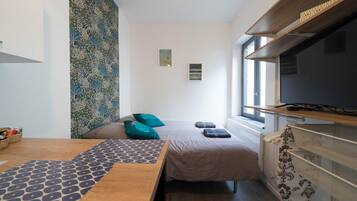 1 chambre, fer et planche à repasser, Wi-Fi gratuit, draps fournis