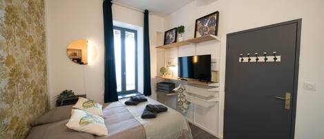 1 chambre, fer et planche à repasser, Wi-Fi gratuit, draps fournis