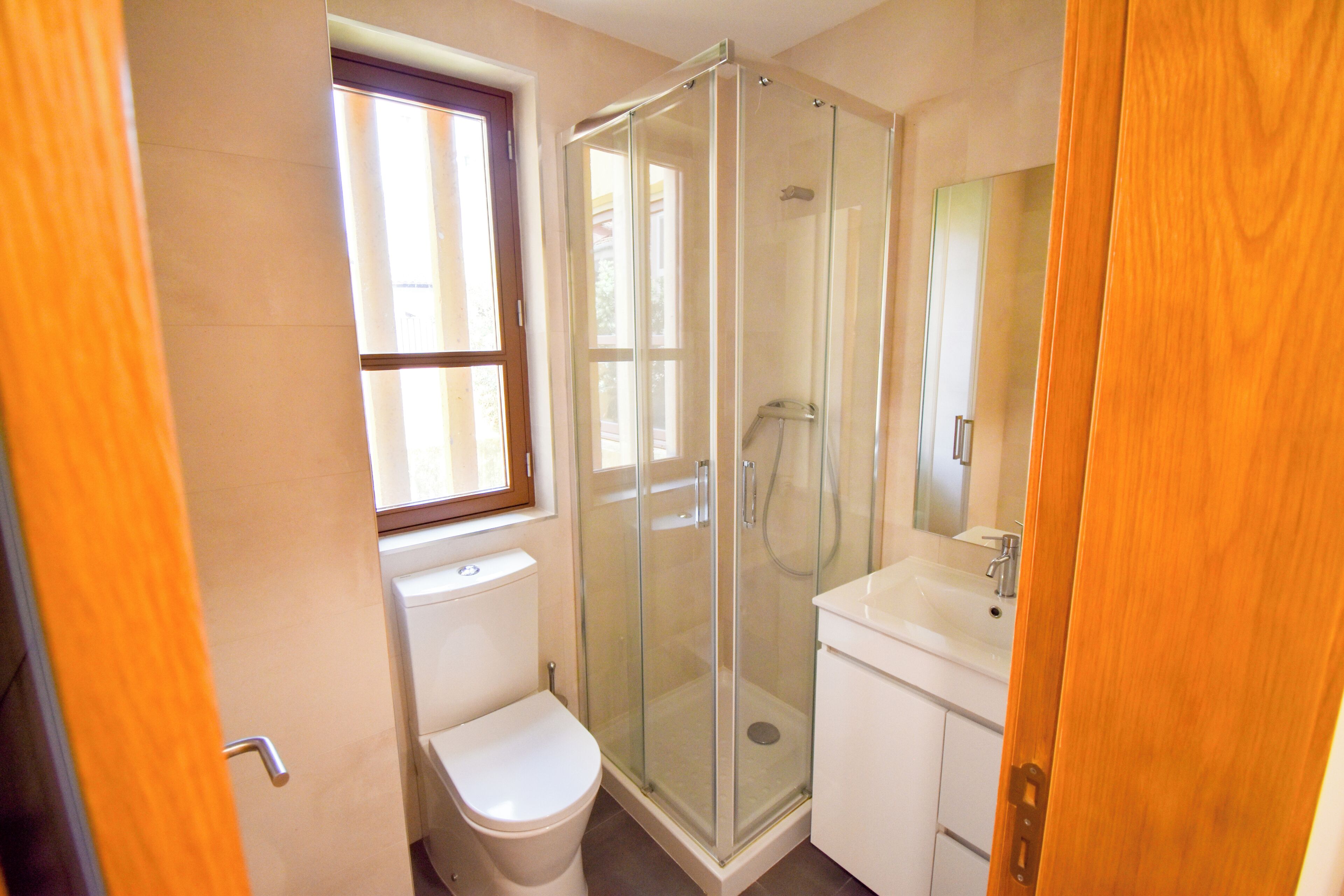 Shower, towels, soap, toilet paper