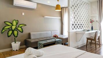 Premium bedding, Tempur-Pedic beds, desk, laptop workspace