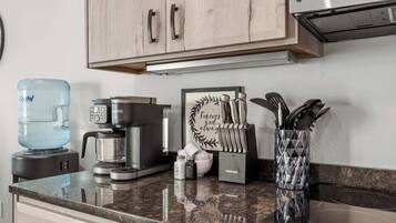 Microwave, stovetop, dishwasher, coffee/tea maker