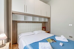 Apartemen Keluarga, beberapa kamar (Seaside Binario Blu 500 M Dal Mare) | 1 kamar tidur, setrika/meja setrika, dan seprai linen
