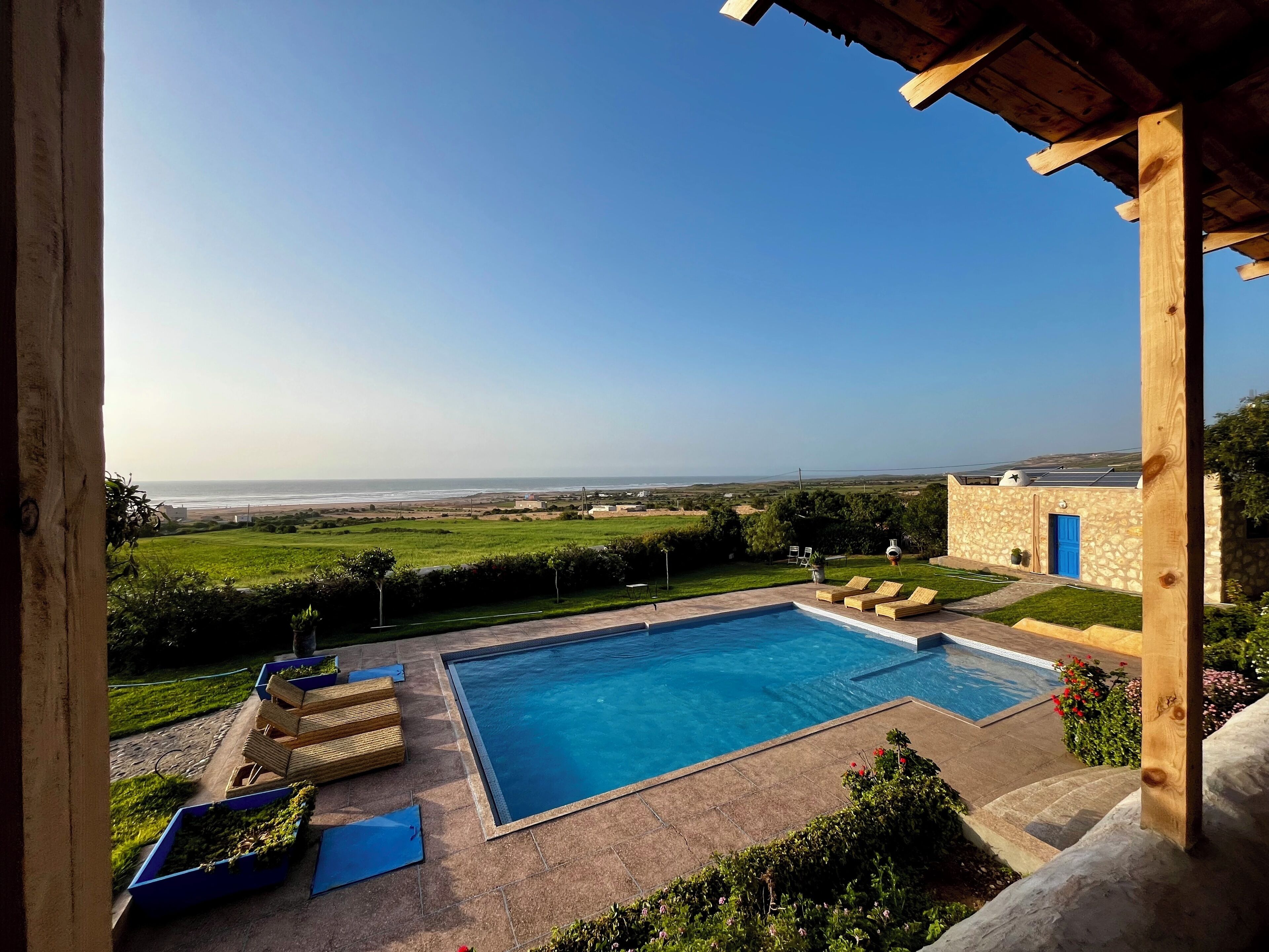 Outdoor pool, pool umbrellas, pool loungers