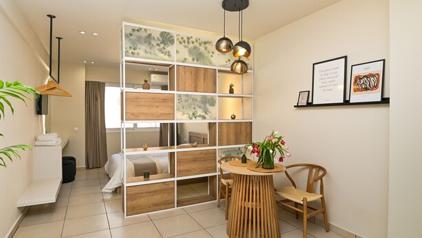 1 غرفة نوم ومكواة/لوح كي وخدمة الإنترنت وملاءات أسرّة
