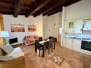 Apartment | Living area | 22-inch flat-screen TV with cable channels