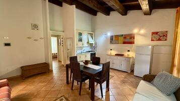 Apartment | Living area | 22-inch flat-screen TV with cable channels