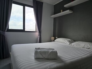 Apartment, Balcony | In-room safe, blackout curtains, iron/ironing board, free WiFi