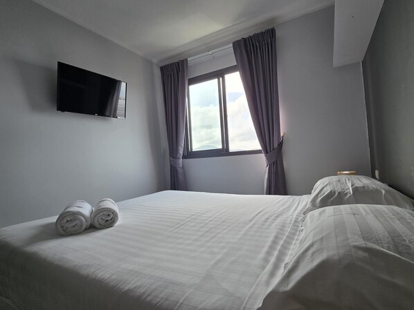 Apartment, Balcony | In-room safe, blackout drapes, iron/ironing board, free WiFi