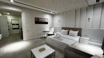 Luxury Suite, Balcony, City View | Minibar (free items), desk, soundproofing, WiFi (free)