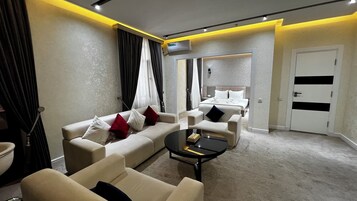 Luxury Suite, Balcony, City View | Minibar (free items), desk, soundproofing, WiFi (free)