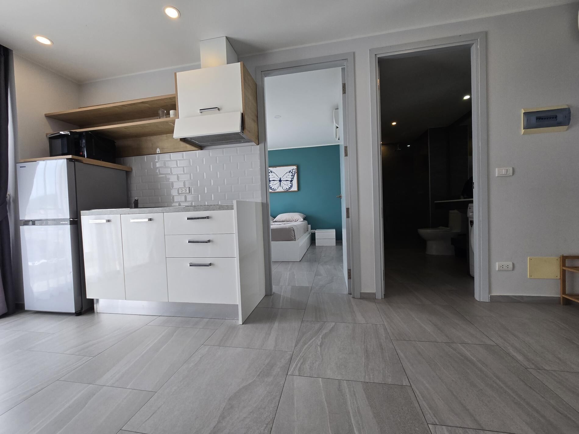 Apartamento, sacada, vista para a cidade | Cozinha americana privada