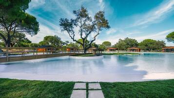 2 outdoor pools, pool umbrellas, pool loungers