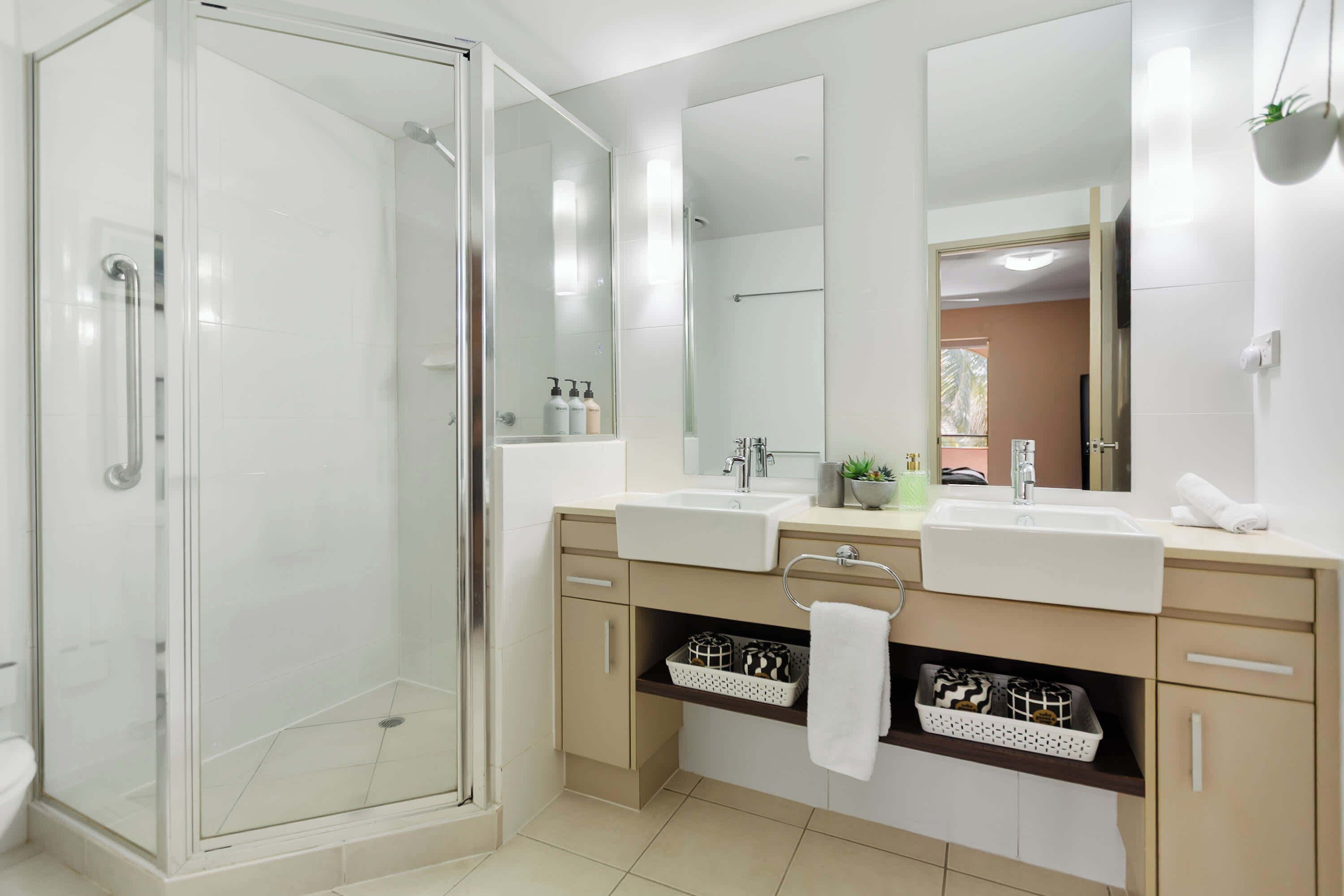 Shower, hair dryer, towels, shampoo