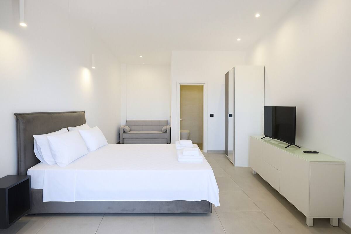Standard Quadruple Room, Balcony, Sea View | Minibar, blackout curtains, soundproofing, iron/ironing board