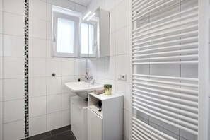 Shower, hair dryer, towels