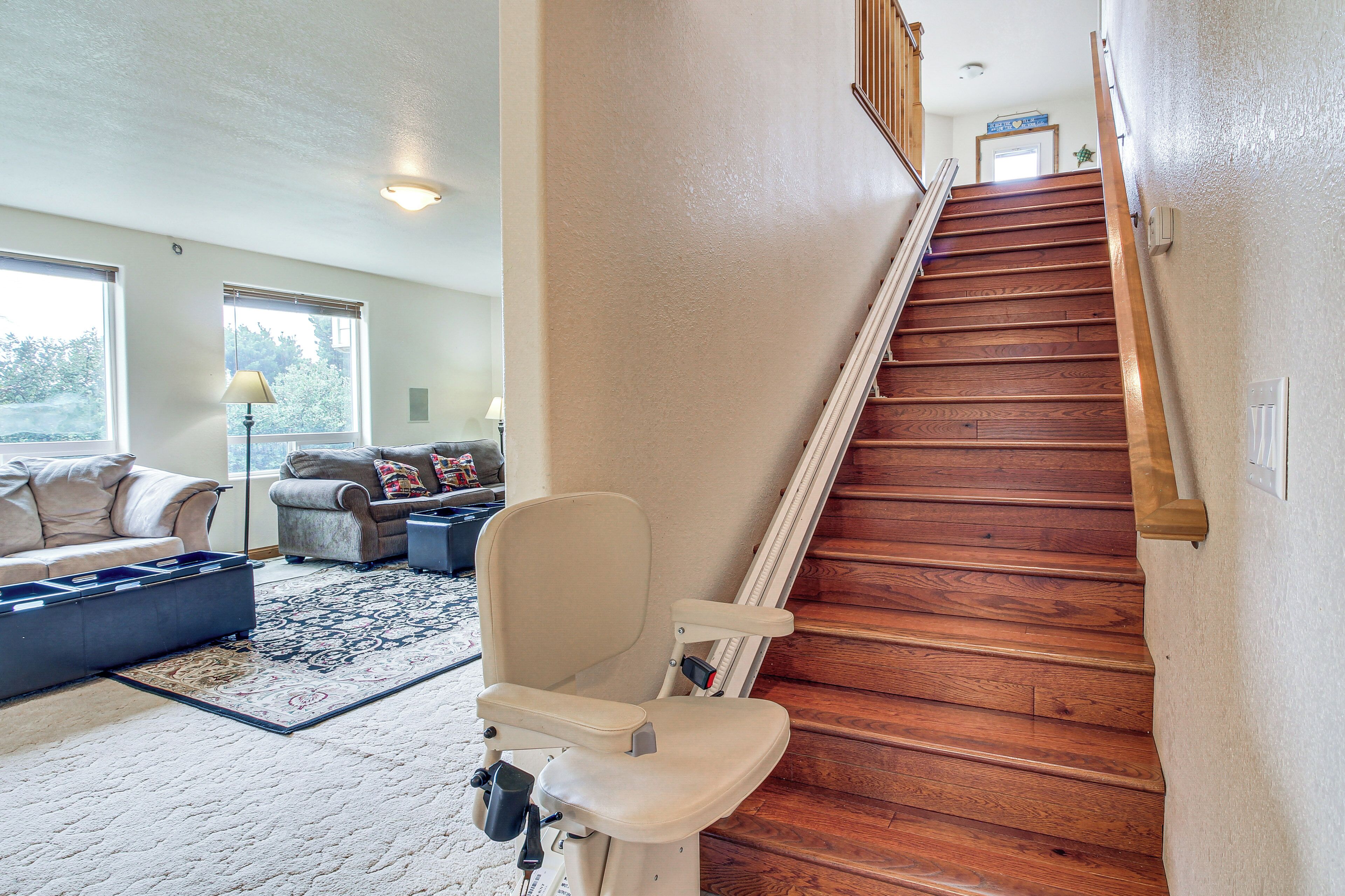 A staircase with wooden steps leading to a landing.