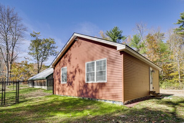 A single-story wooden building with a gabled roof and two windows. - Wooded Retreat w/ Pet-friendly Yard in Standish (Standish)
