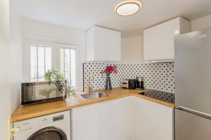 Apartment | Private kitchen | Fridge, microwave, stovetop, toaster