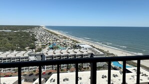 A coastal hotel with multiple buildings, a beach, and a clear view of the ocean. - Myrtle Beach Resort RT1717 (Myrtle Beach)