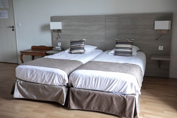 Habitación cuádruple superior, baño privado, vista a la ciudad | Wifi gratis