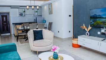 Classic Apartment, Balcony, City View | Living area | 55-inch plasma TV with cable channels, Netflix, first-run movies