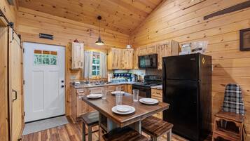 Cabin, 2 Bedrooms | Private kitchen | Fridge, oven, coffee/tea maker