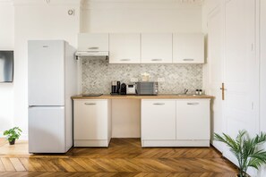 Apartment, Garden View | Private kitchen | Fridge, microwave, stovetop, toaster