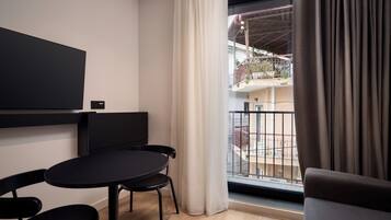 Superior Studio | Living area | 32-inch TV with cable channels