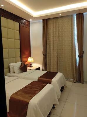 Fer et planche à repasser, Wi-Fi gratuit, draps fournis