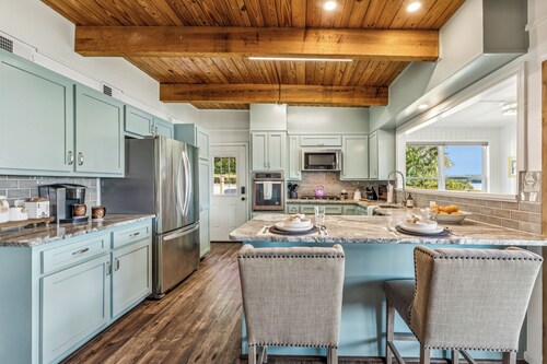 Flat Fenced Yard Lakefront Home with Boat Ramp, Boat House and Screened Porch