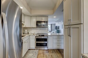 Fridge, microwave, dishwasher, coffee/tea maker