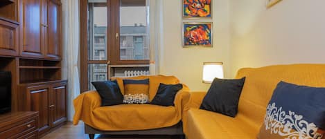 Apartment, 1 Bedroom, Balcony | Living area | 30-inch TV with satellite channels