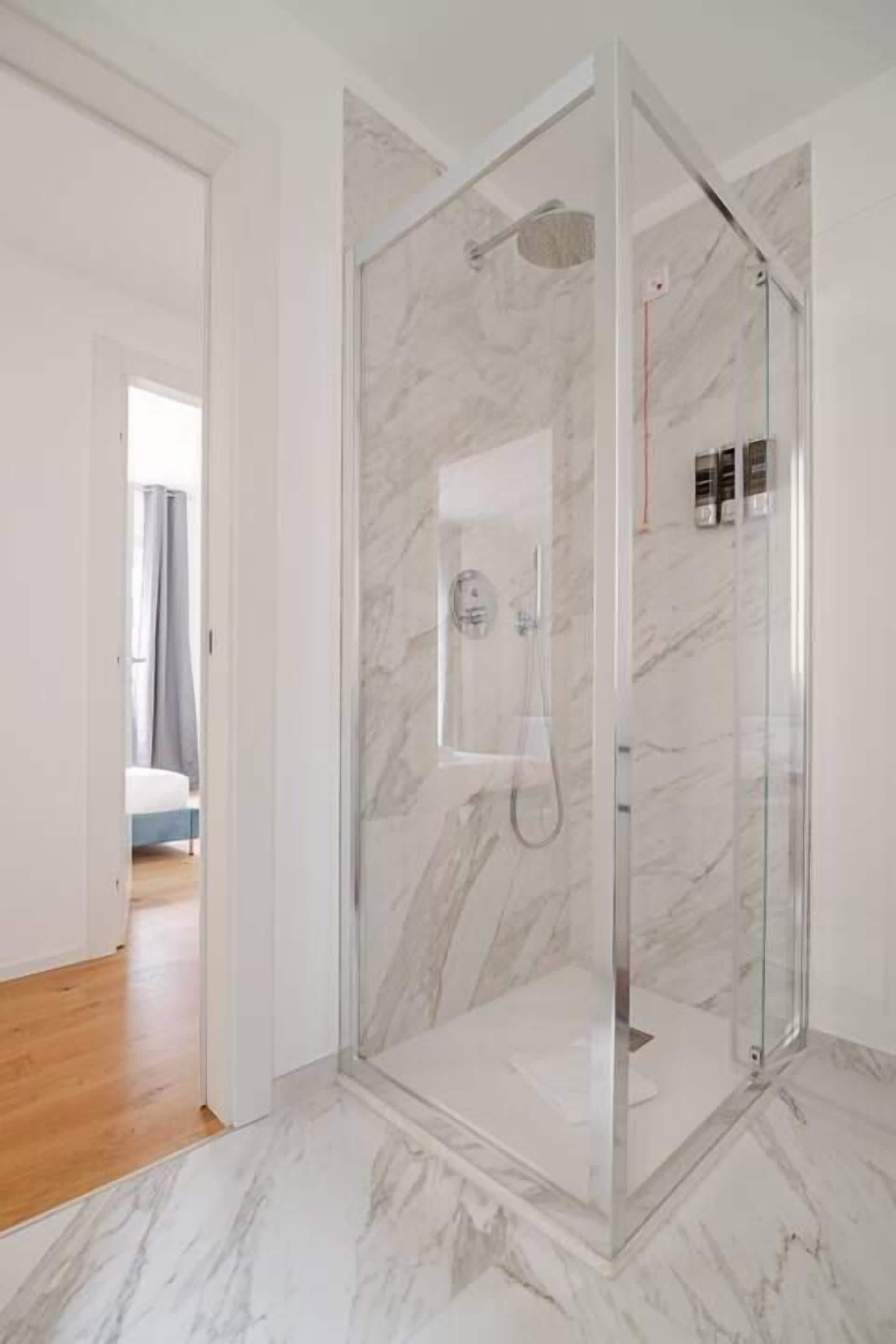 Shower, free toiletries, hair dryer, towels