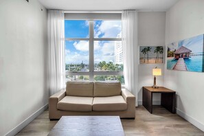 Apartment, 1 Queen Bed with Sofa bed, Balcony (Between Lakes and Ocean) | Living area - Between Lakes and Ocean For 4 (Hollywood)