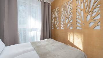 Fer et planche à repasser, lit parapluie, Wi-Fi, draps fournis