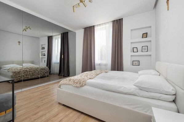 1 bedroom, desk, iron/ironing board, travel crib