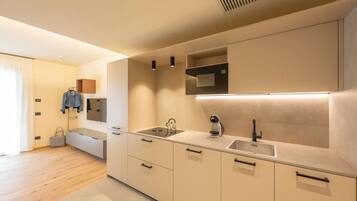 Apartment, 1 Bedroom, Tower | Private kitchen | Fridge, microwave, stovetop, dishwasher