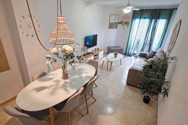 Deluxe Apartment, 3 Bedrooms | Living area | 48-inch Smart TV with digital channels
