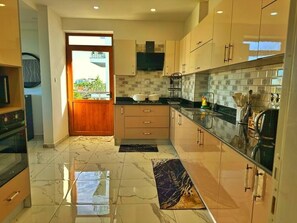 Fridge, microwave, dishwasher, cookware/dishes/utensils - Nyali Holiday Apartments Aqua Garden (Mombasa)