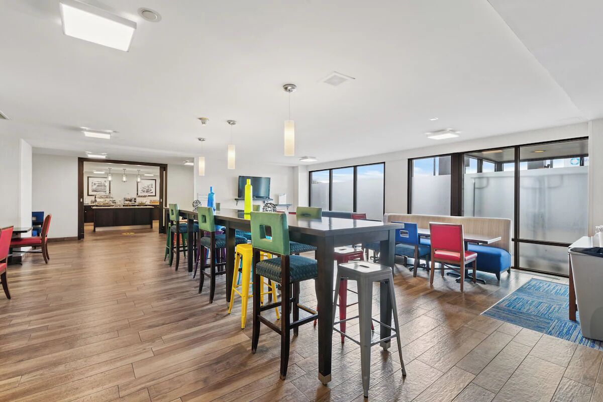 Gather and relax in spacious lounge seating with natural light.